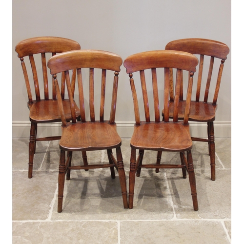 629 - A matched set of six elm and beech wood Victorian kitchen chairs, each chair with a lath back over a... 