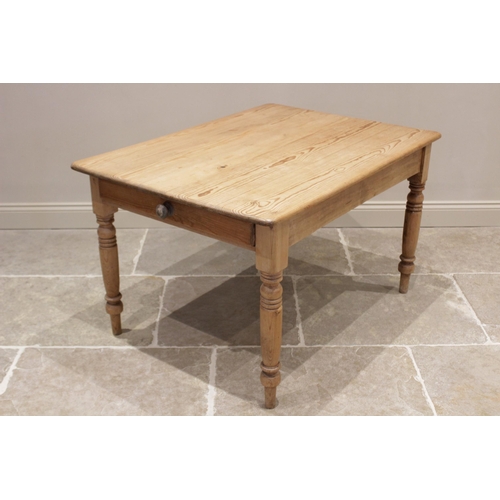 633 - A Victorian pine kitchen table, the rectangular top with rounded corners above a single frieze drawe... 