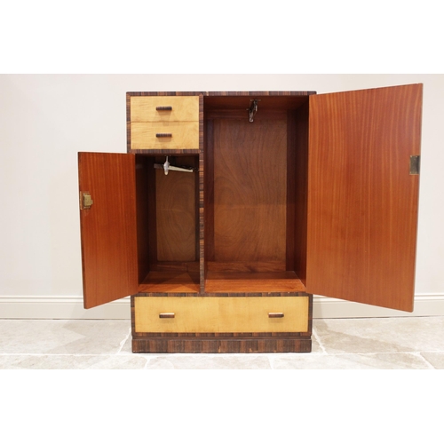 643 - An Art Deco style satin birch and cross banded gentleman's wardrobe, mid 20th century, of rectangula... 