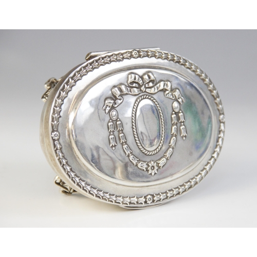 65 - An Edwardian silver mounted jewellery casket, Henry Matthews, Birmingham 1906, of tapered oval form ... 