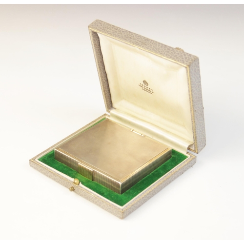 66 - An Art Deco silver compact/cigarette case, retailed by Asprey, marks for ‘FOS’ London 1937, of recta... 