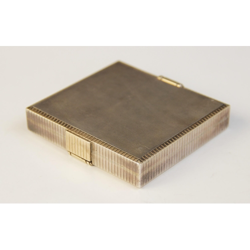 66 - An Art Deco silver compact/cigarette case, retailed by Asprey, marks for ‘FOS’ London 1937, of recta... 