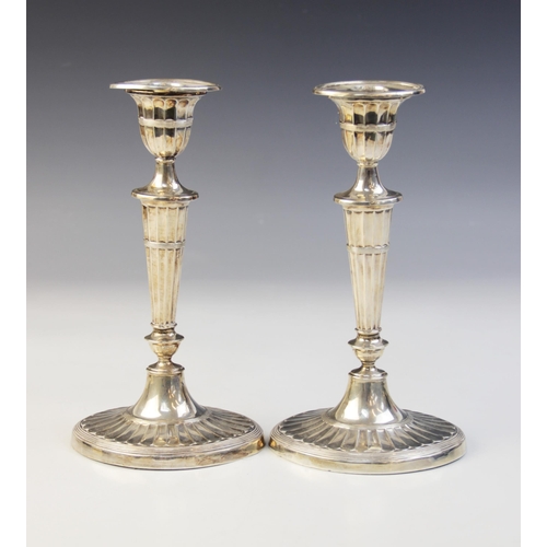 74 - A pair of late Victorian silver candlesticks, Harrison Brothers & Howson, Sheffield 1899, each with ... 