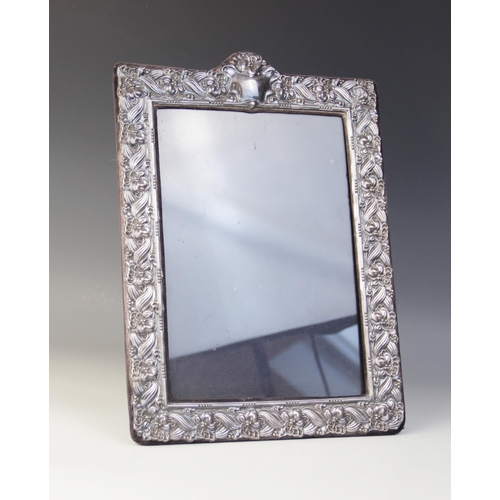 8 - A silver mounted Art Nouveau style photograph frame, John Bull Ltd, London 1990, of rectangular form... 