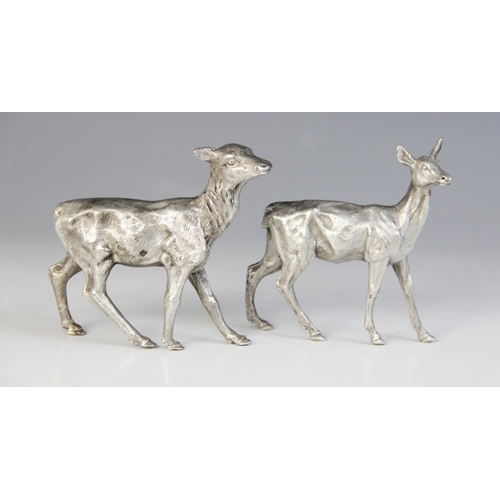 84 - Two silver plated models of deer, each realistically modelled with fur effect chasing, one numbered ... 