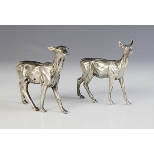 84 - Two silver plated models of deer, each realistically modelled with fur effect chasing, one numbered ... 