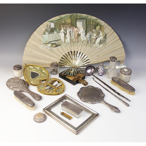 9 - A selection of dressing tableware and accessories, to include; an Edwardian silver mounted cut glass... 