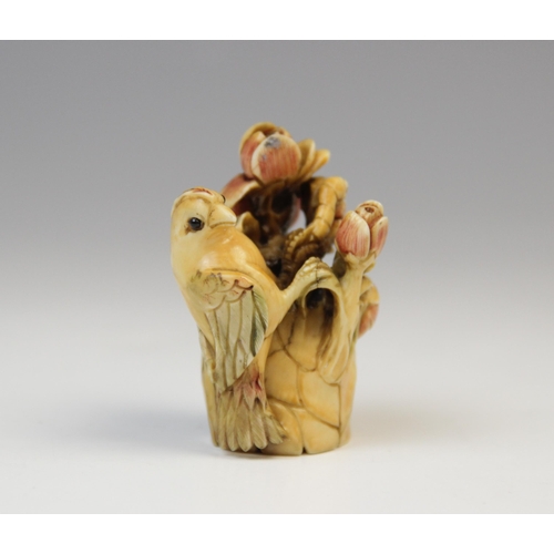 96 - A Chinese carved ivory okimono of small proportions, 19th century, modelled as an exotic bird perche... 