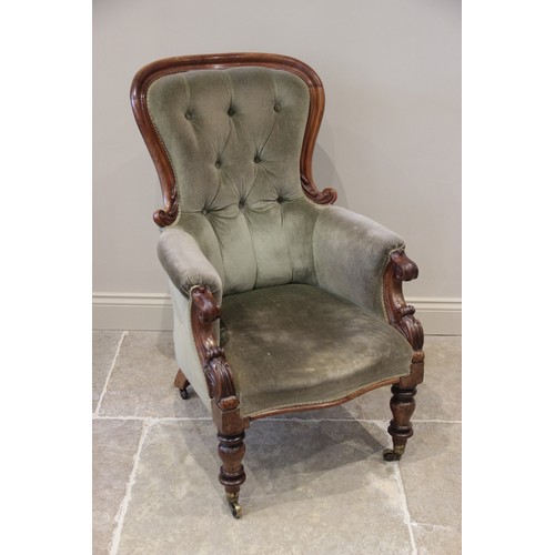 628A - A Victorian mahogany framed drawing room chair, in green velour, the shaped and button back extendin... 