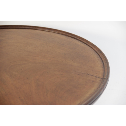 615 - A 19th century mahogany Lazy Susan, of typical form with turned pedestal base and revolving circular... 