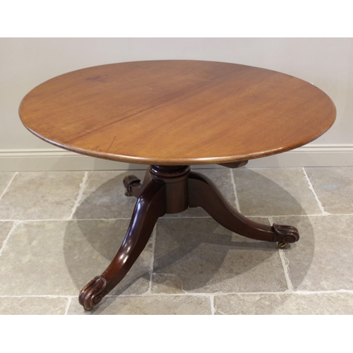 616 - A mid 19th century mahogany centre table, the circular top raised upon a squat baluster column exten... 