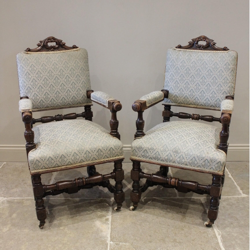 623 - A set of six oak 17th century revival dining chairs, late 19th century, each with a 'C' scroll leaf ... 