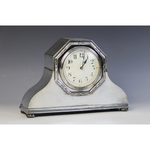 86 - A French Edwardian silver plated mantle clock, circular dial with Arabic numerals, key-wind movement... 