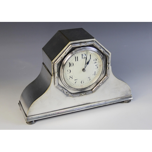 86 - A French Edwardian silver plated mantle clock, circular dial with Arabic numerals, key-wind movement... 