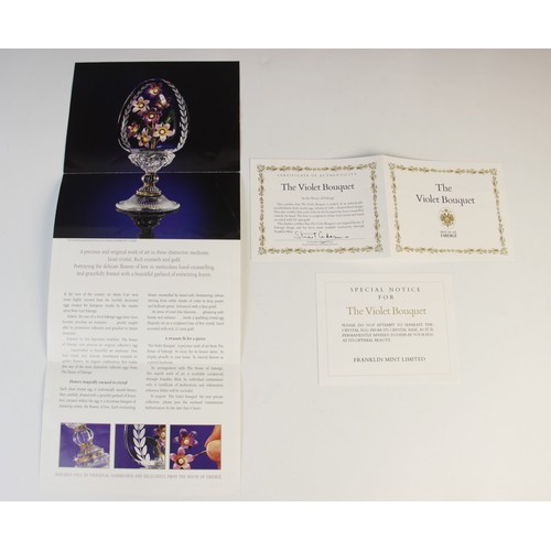 91 - A Frankin Mint 1984 House of Igor Carl Faberge Imperial Anniversary Egg, the silver egg with purple ... 