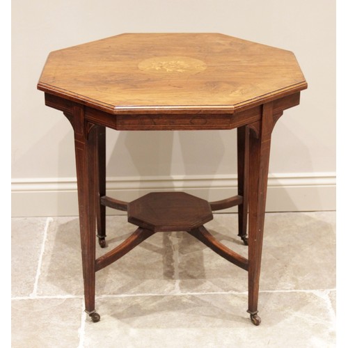 597 - A late Victorian octagonal rosewood occasional table, the top centred with inlaid foliate and musica... 