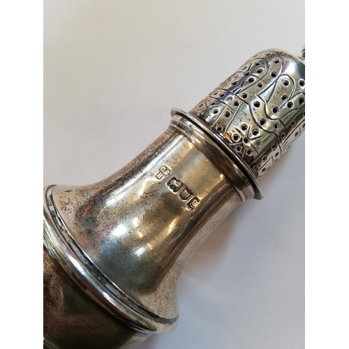 72 - An early Irish silver sugar caster (marks worn), of typical baluster form on domed circular foot wit... 