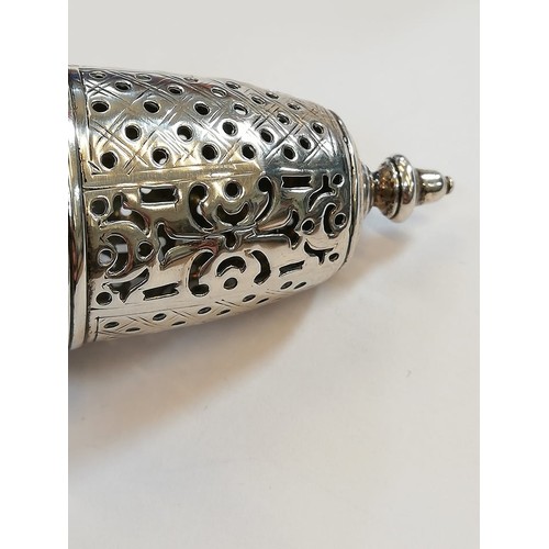 72 - An early Irish silver sugar caster (marks worn), of typical baluster form on domed circular foot wit... 