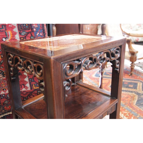 631 - A Chinese hardwood and marble nightstand, early 20th century, the rectangular top inset with a rouge... 