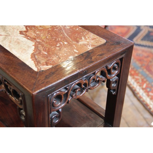 631 - A Chinese hardwood and marble nightstand, early 20th century, the rectangular top inset with a rouge... 