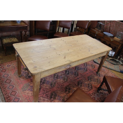 589 - A Victorian and later pine scrub top kitchen table, the rectangular table top with rounded corners o... 