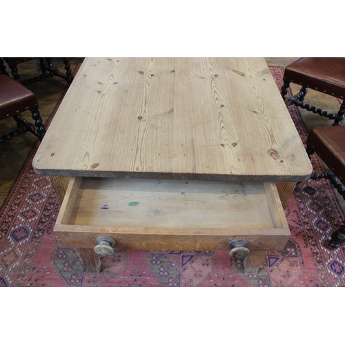 589 - A Victorian and later pine scrub top kitchen table, the rectangular table top with rounded corners o... 