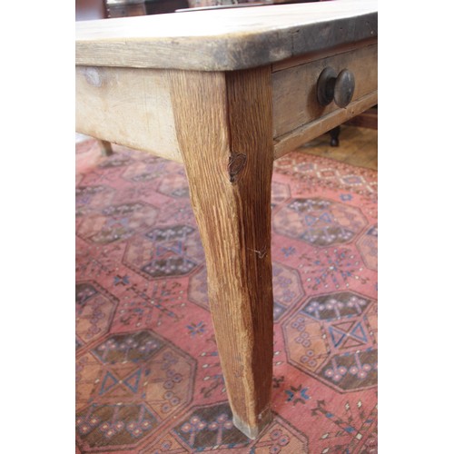 589 - A Victorian and later pine scrub top kitchen table, the rectangular table top with rounded corners o... 