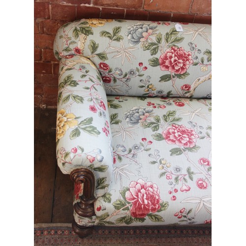 632 - A Victorian Howard type sofa, upholstered in Morris & Co 'Tangley' fabric on an eggshell ground, the... 