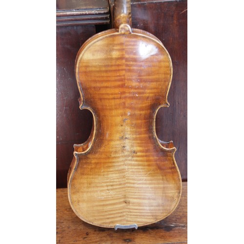 113 - A violin, 19th century with later additions and modifications, the 27cm long body with two piece bac... 