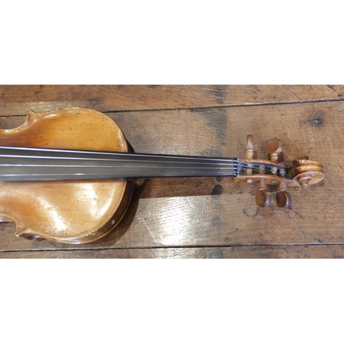 113 - A violin, 19th century with later additions and modifications, the 27cm long body with two piece bac... 