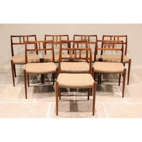 1177 - A set of eight Danish rosewood dining chairs, probably Indian rosewood, manufactured by JL Møller ci... 