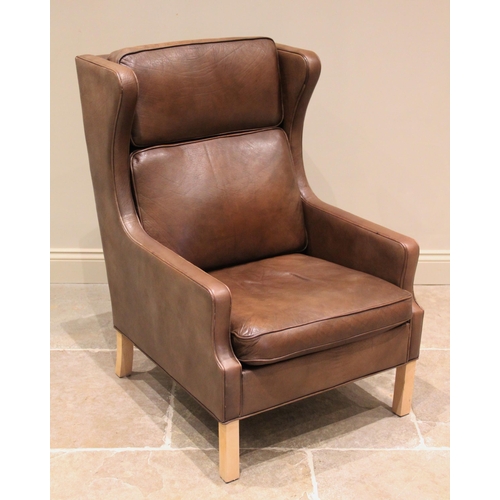 1179 - A Borge Morgensen Danish style leather armchair, circa 1960, the tan leather chair with shaped wing ... 