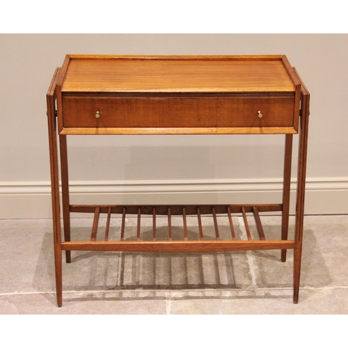 1180 - A Danish style teak side or console table, circa 1960, the suspended table top with a three quarter ... 