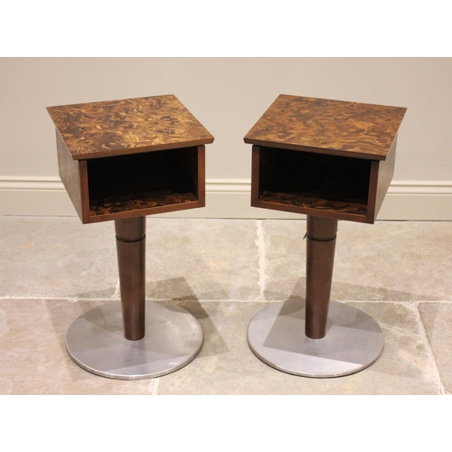 1181 - A pair of 1970's retro bedside/lamp tables, the square burr veneered tops above a rectangular vacant... 