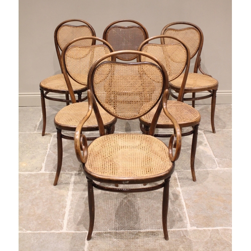 1184 - A matched set of six Thonet type bentwood chairs, early 20th century, each with a cordiform rattan b... 