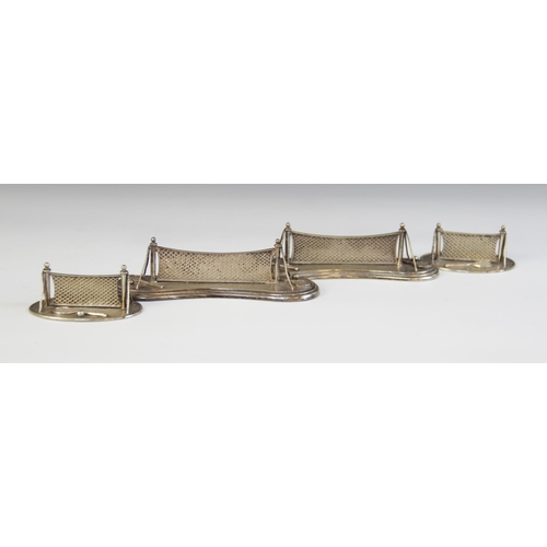 120 - SPORTING INTEREST: A pair of 19th century silver plated novelty tennis knife rests, the waisted base... 