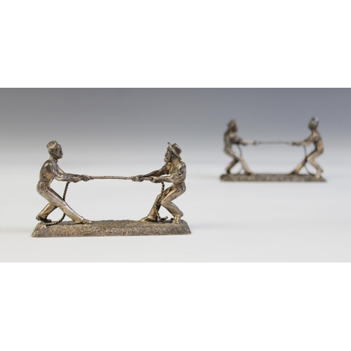 122 - A pair of 19th novelty silver plated knife rests by William Hutton & Sons, in the form of a sailor a... 