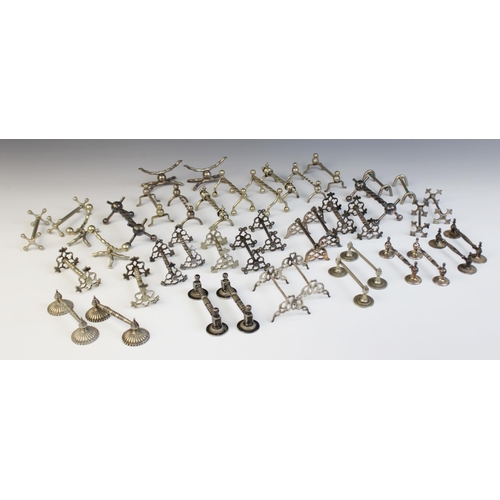 128 - A large selection of 19th century and later cutlery rests, of assorted ages, styles and sizes (Qty)