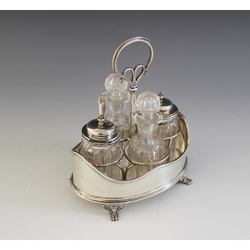 28 - An Edwardian cut glass silver cruet set and stand, Thomas Bradbury & Sons, Sheffield 1908, complete ... 