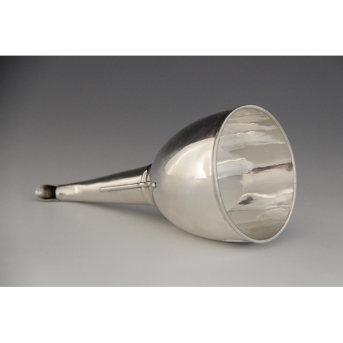 74 - A William IV silver wine funnel, marks for 'I.H', London 1831, of typical form, plain polished with ... 