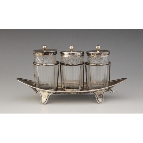 76 - A George III silver desk stand, Henry Chawner, London 1792, the navette shaped base with reeded bord... 