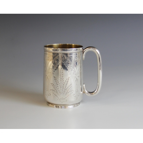 77 - A Victorian silver christening mug, Josiah Williams & Co, Chester 1877, of tapering cylindrical form... 