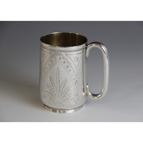 77 - A Victorian silver christening mug, Josiah Williams & Co, Chester 1877, of tapering cylindrical form... 