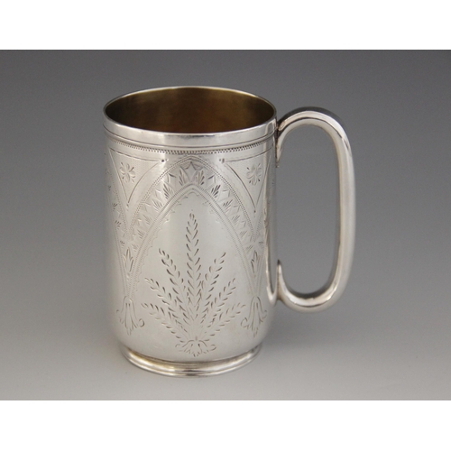 77 - A Victorian silver christening mug, Josiah Williams & Co, Chester 1877, of tapering cylindrical form... 