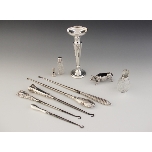 91 - A selection of dressing tableware, to include a George V silver weighted posy vase, Robert Pringle &... 