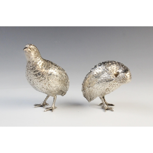 105 - A pair of silver plated grouse models, in the manner of Patrick Mavros, each realistically modelled ... 