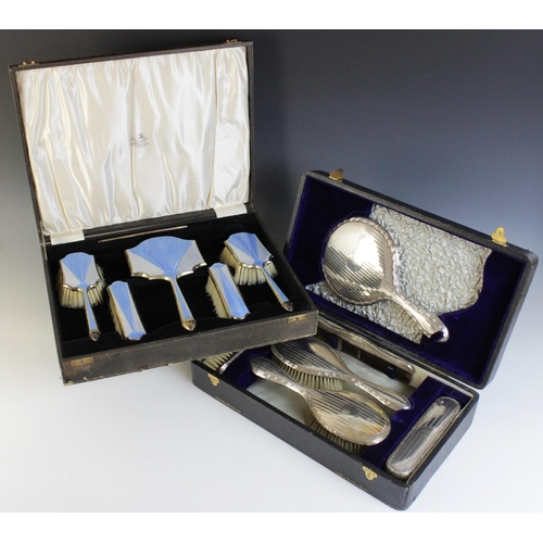 16 - An Art Deco silver and enamel backed dressing table set, A & J Zimmerman Ltd, 1930-31,  comprising; ... 