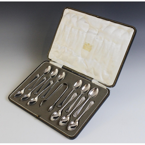 66 - A cased set of twelve George V silver teaspoons, Manoah Rhodes & Sons Ltd, Sheffield 1927, each with... 