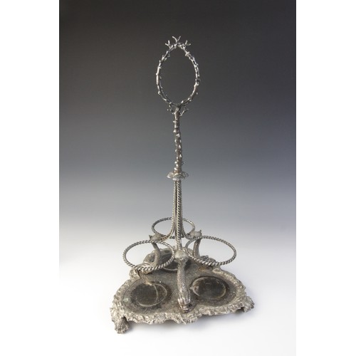 109 - A late 19th century silver plated triple decanter stand, trefoil base with cast rim and shell feet, ... 