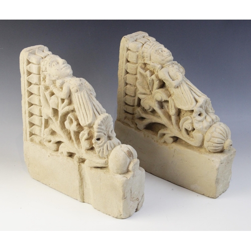 100 - A pair of carved stone brackets, each depicting a female figure in elaborate robes upon a shell and ... 